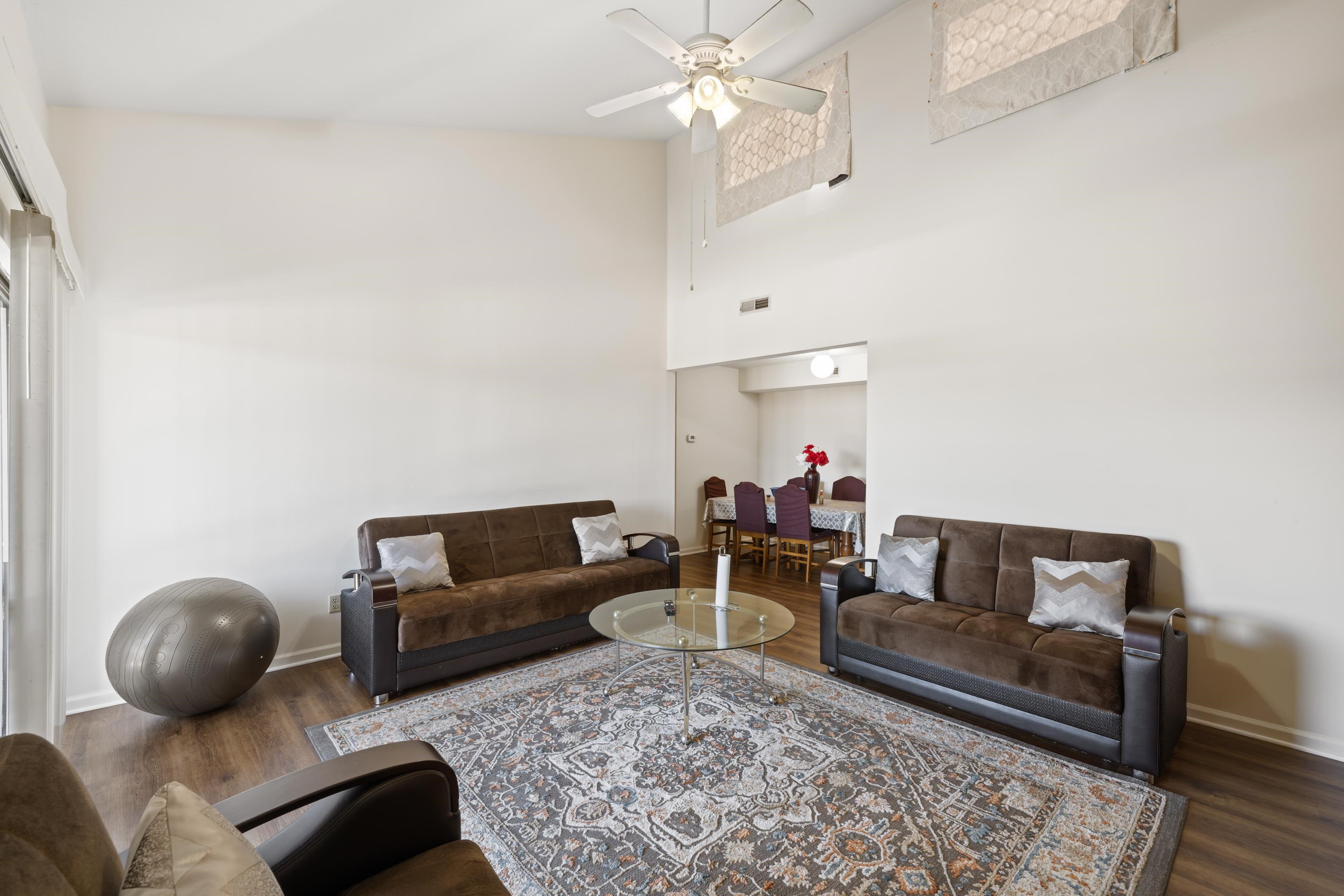 1116 Blue Ridge Drive, Unit 11 Harrisonburg, VA 22802 - Photo 7 of 21 a living room with furniture and a rug