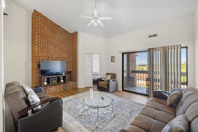 a kitchen with a stove a sink and a refrigerator