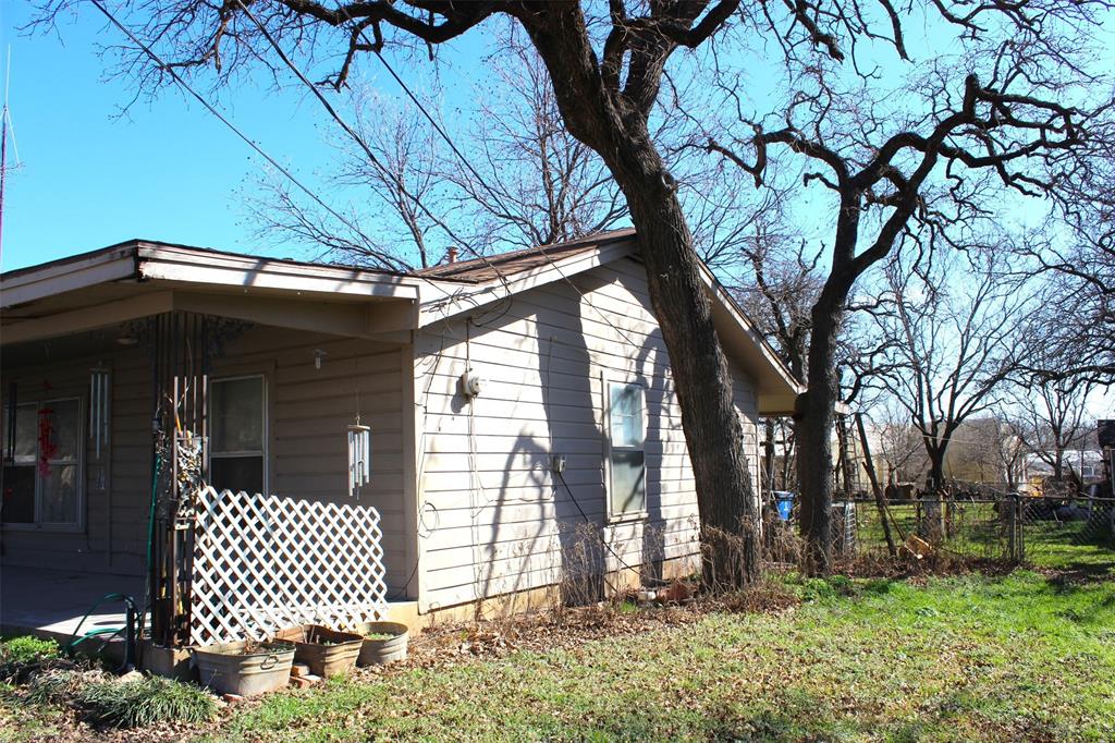 403 Mockingbird Street Chico, TX 76431 - Photo 15 of 25 a front view of a house