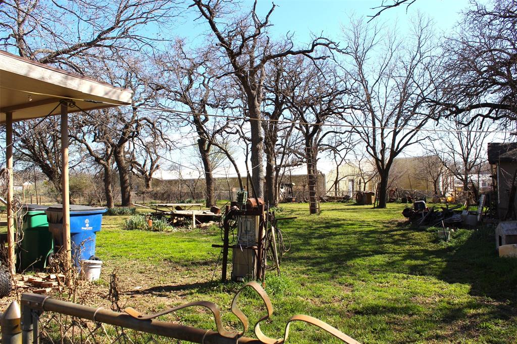 403 Mockingbird Street Chico, TX 76431 - Photo 19 of 25 a view of a park with large trees