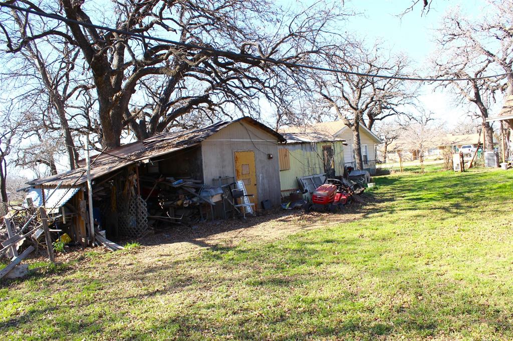 403 Mockingbird Street Chico, TX 76431 - Photo 23 of 25 a view of a house with yard and covered with snow