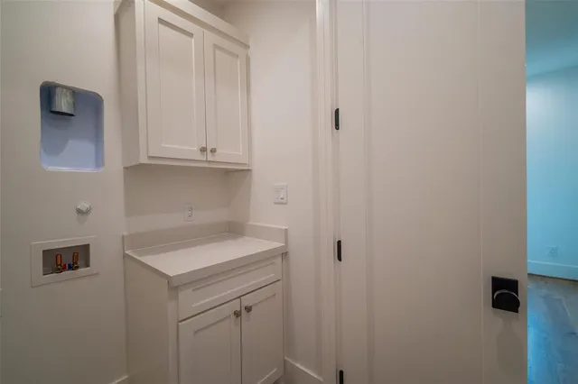 a bathroom with a sink and vanity