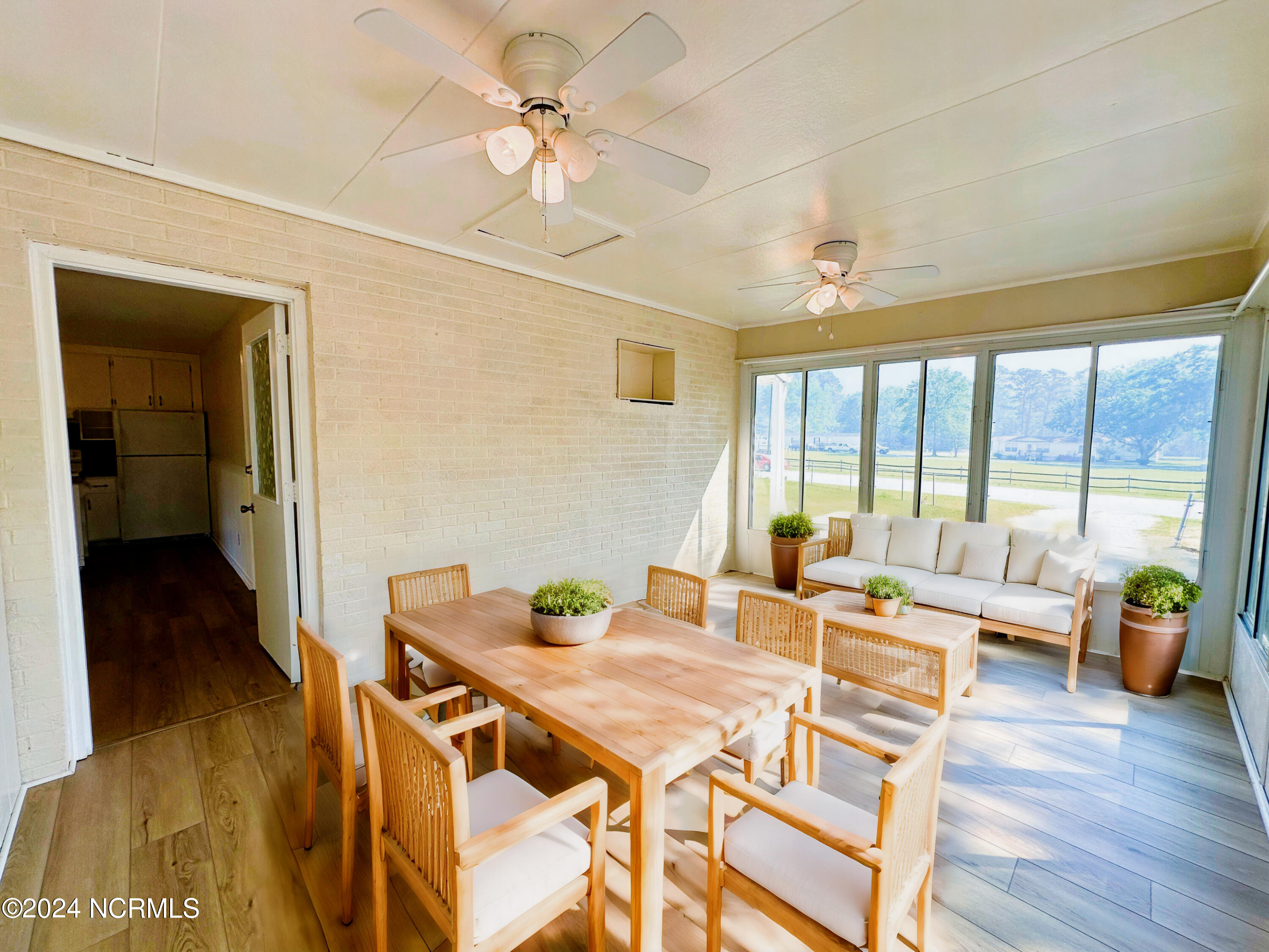 452 Nine Foot Road Newport, NC 28570 - Photo 26 of 32 virtually staged sunroom