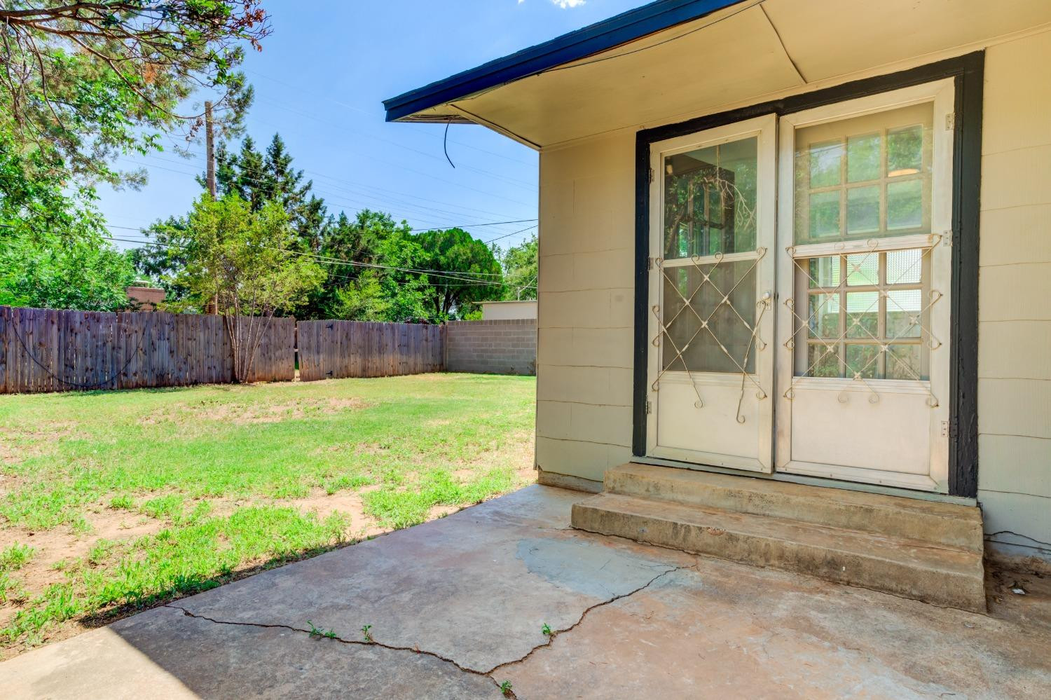 3411 41st Street Lubbock, TX 79413 - Photo 26 of 29 a view of a backyard with a garden and plants