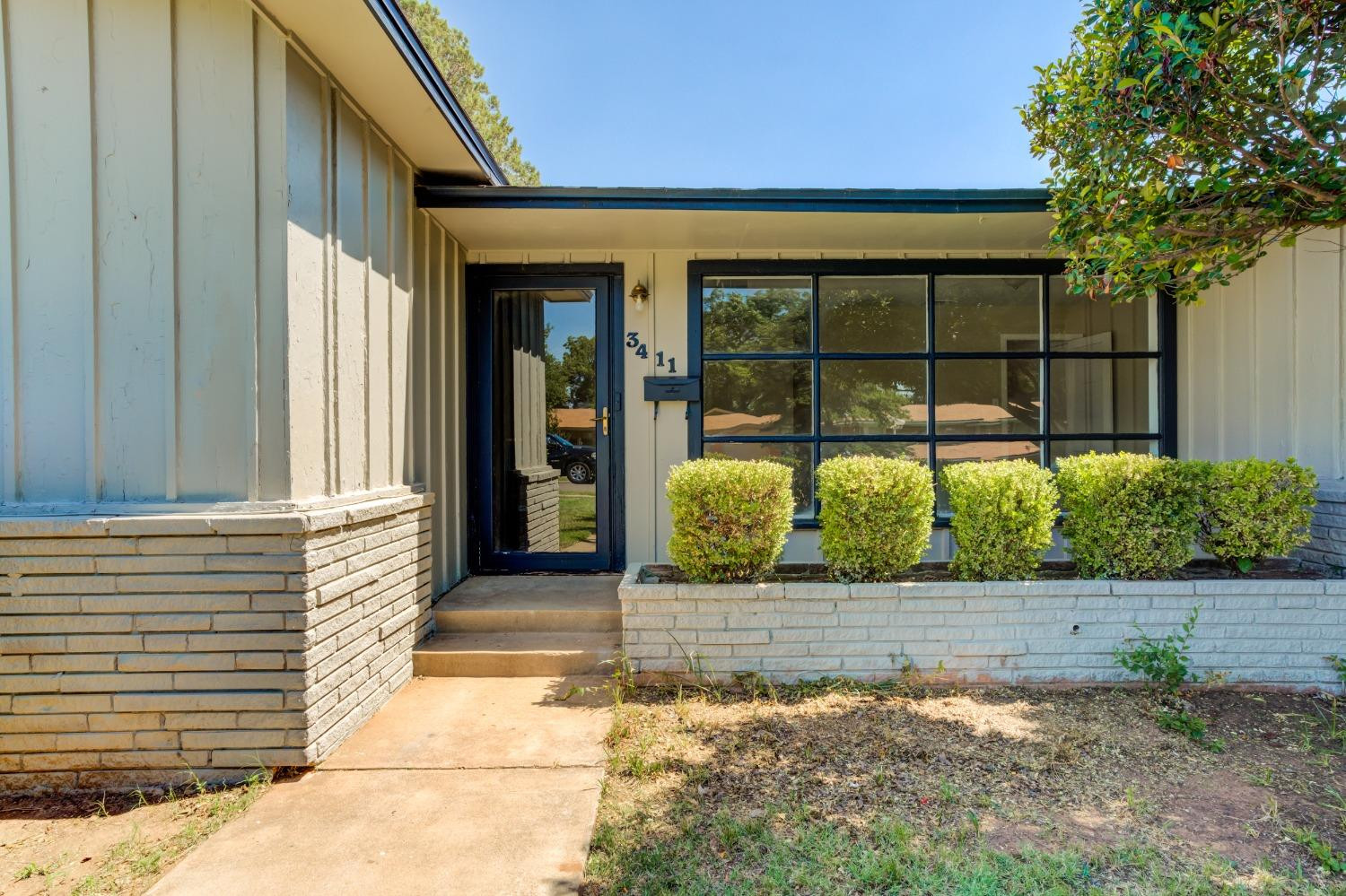 3411 41st Street Lubbock, TX 79413 - Photo 3 of 29 a view of entrance gate of the house