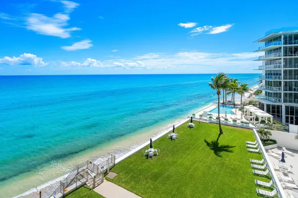 a view of an ocean with a big yard