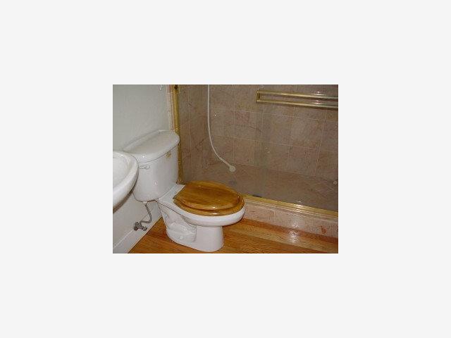 200 Rhodes Court San Jose, CA 95126 - Photo 2 of 9 a bathroom with a toilet and a shower