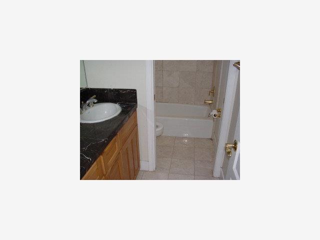 200 Rhodes Court San Jose, CA 95126 - Photo 7 of 9 a picture of a bathroom with a sink and a mirror