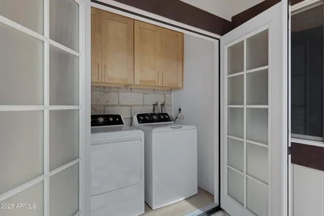a room with a cabinets and appliances