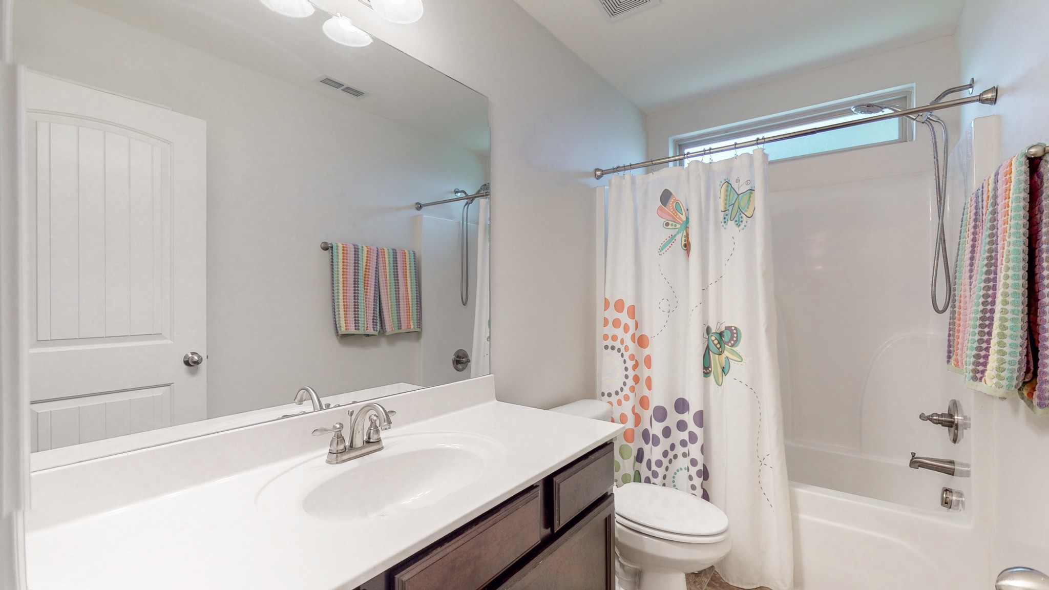 1004 Kyle Road Spring Hill, TN 37174 - Photo 22 of 40 a bathroom with a sink toilet and shower