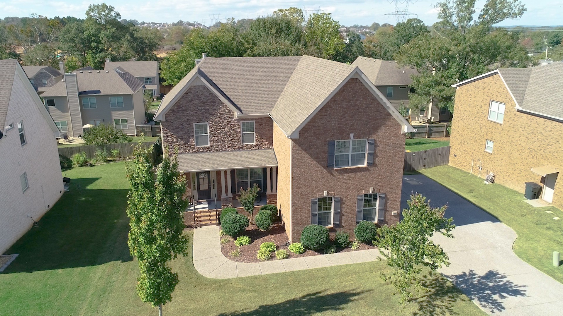 1004 Kyle Road Spring Hill, TN 37174 - Photo 38 of 40 a aerial view of a house next to a yard