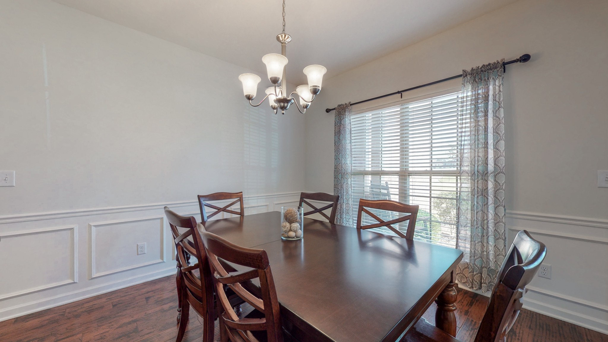 1004 Kyle Road Spring Hill, TN 37174 - Photo 7 of 40 a view of a dining room with furniture window and wooden floor