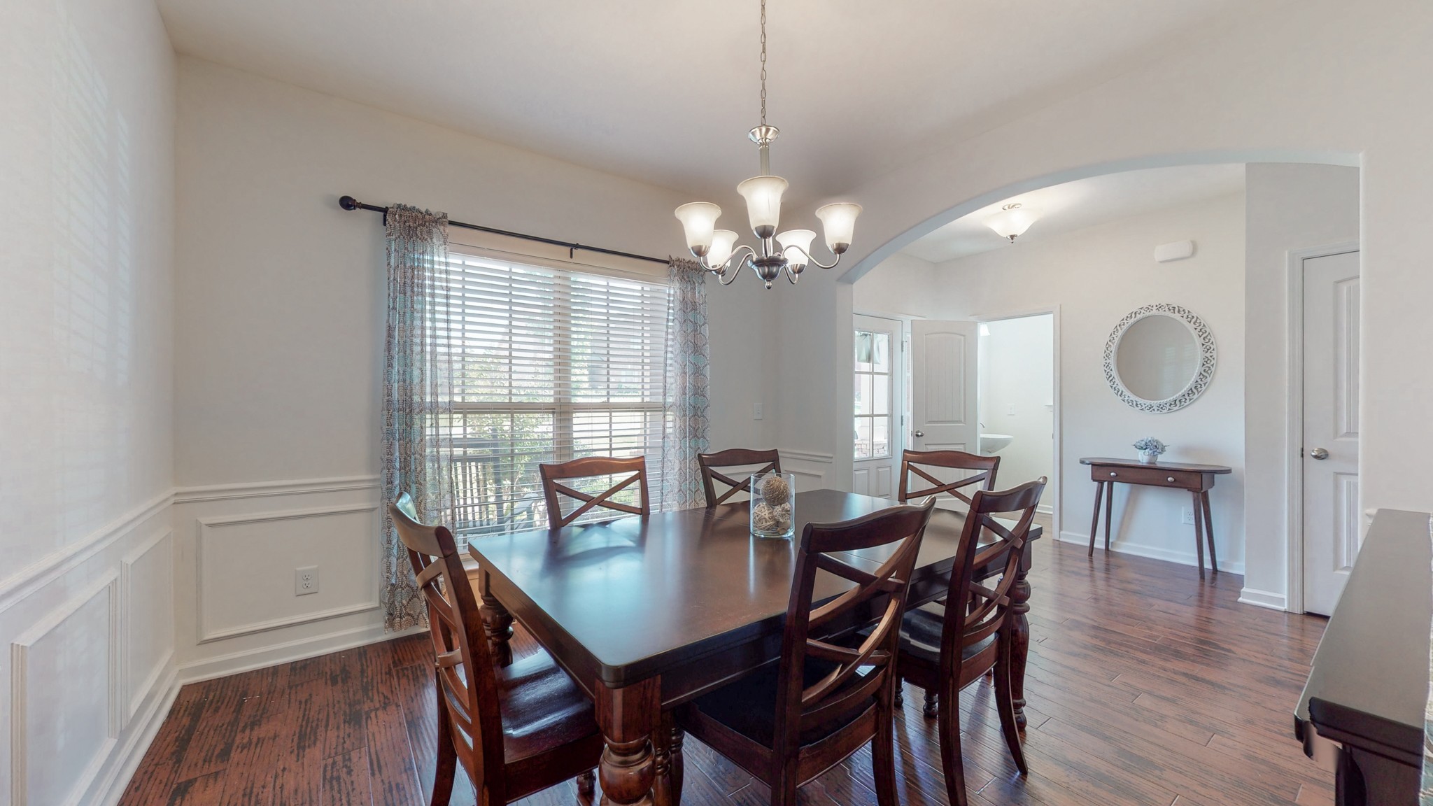 1004 Kyle Road Spring Hill, TN 37174 - Photo 8 of 40 a view of a dining room with furniture window and wooden floor
