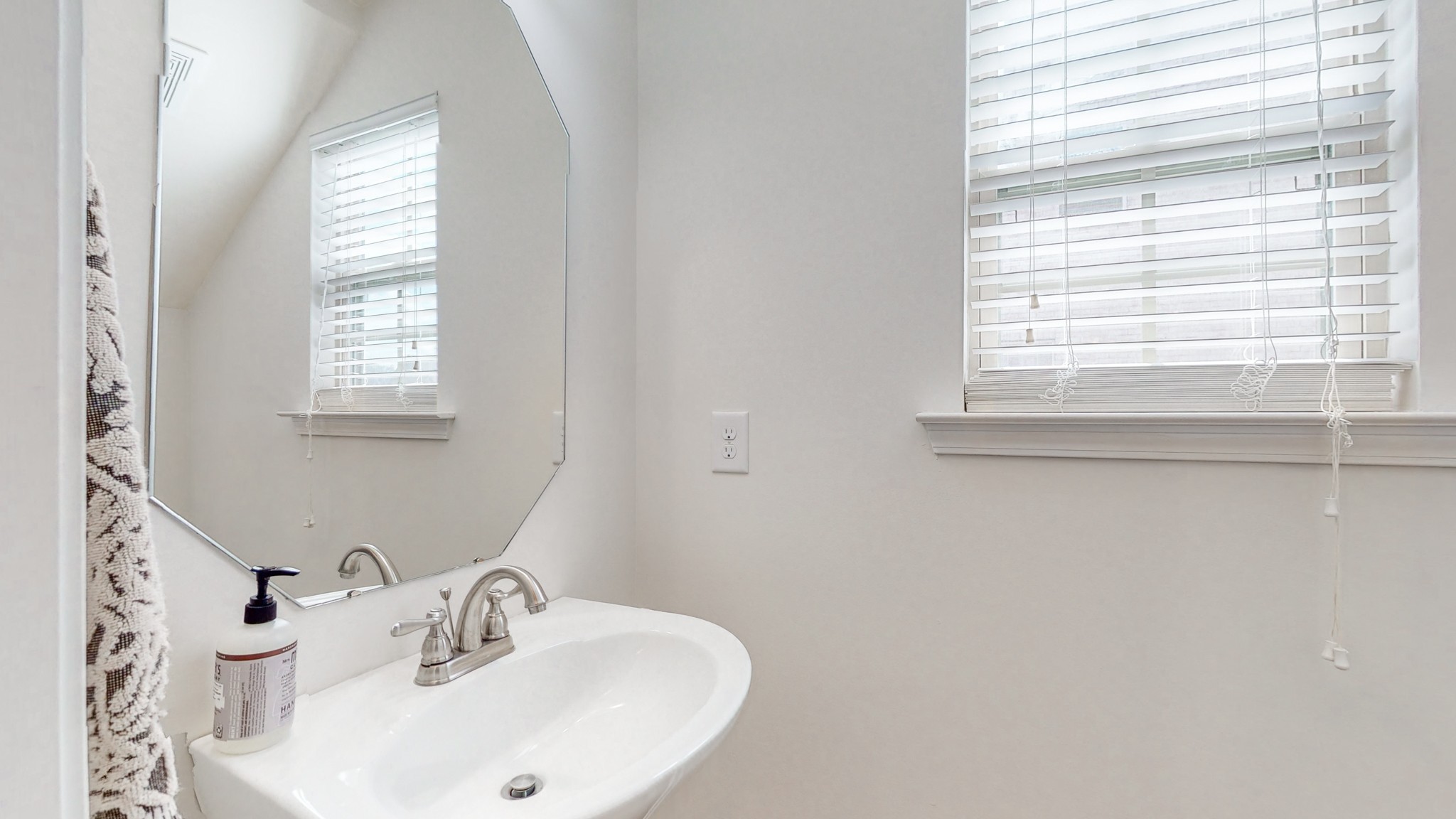 1004 Kyle Road Spring Hill, TN 37174 - Photo 9 of 40 a bathroom with a sink and a window