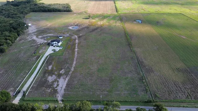 a view of a lake from a corridor