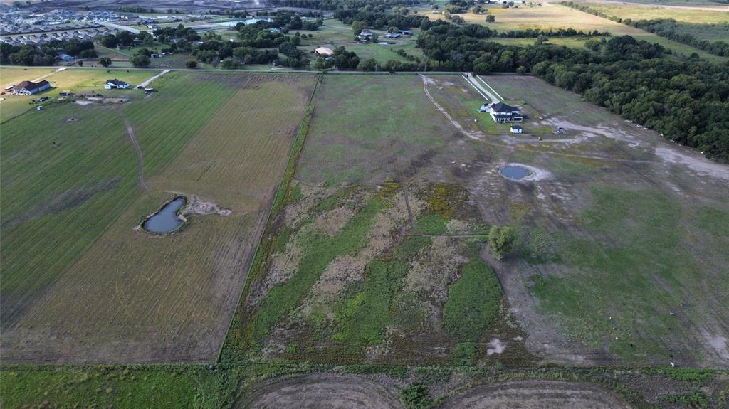 617 Liska Road Ennis, TX 75119 - Photo 4 of 4 an aerial view of a house with a yard