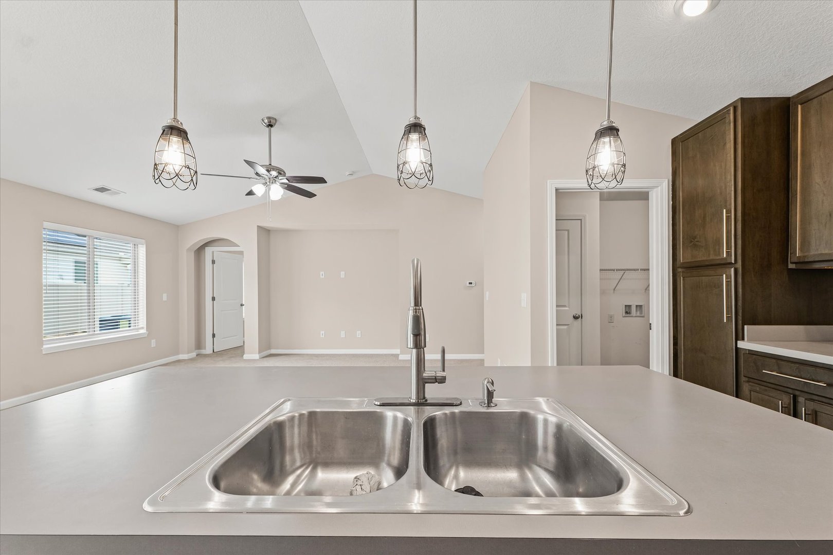 3109 Stanley Lane Champaign, IL 61822 - Photo 20 of 39 a kitchen with a sink a counter space and stainless steel appliances