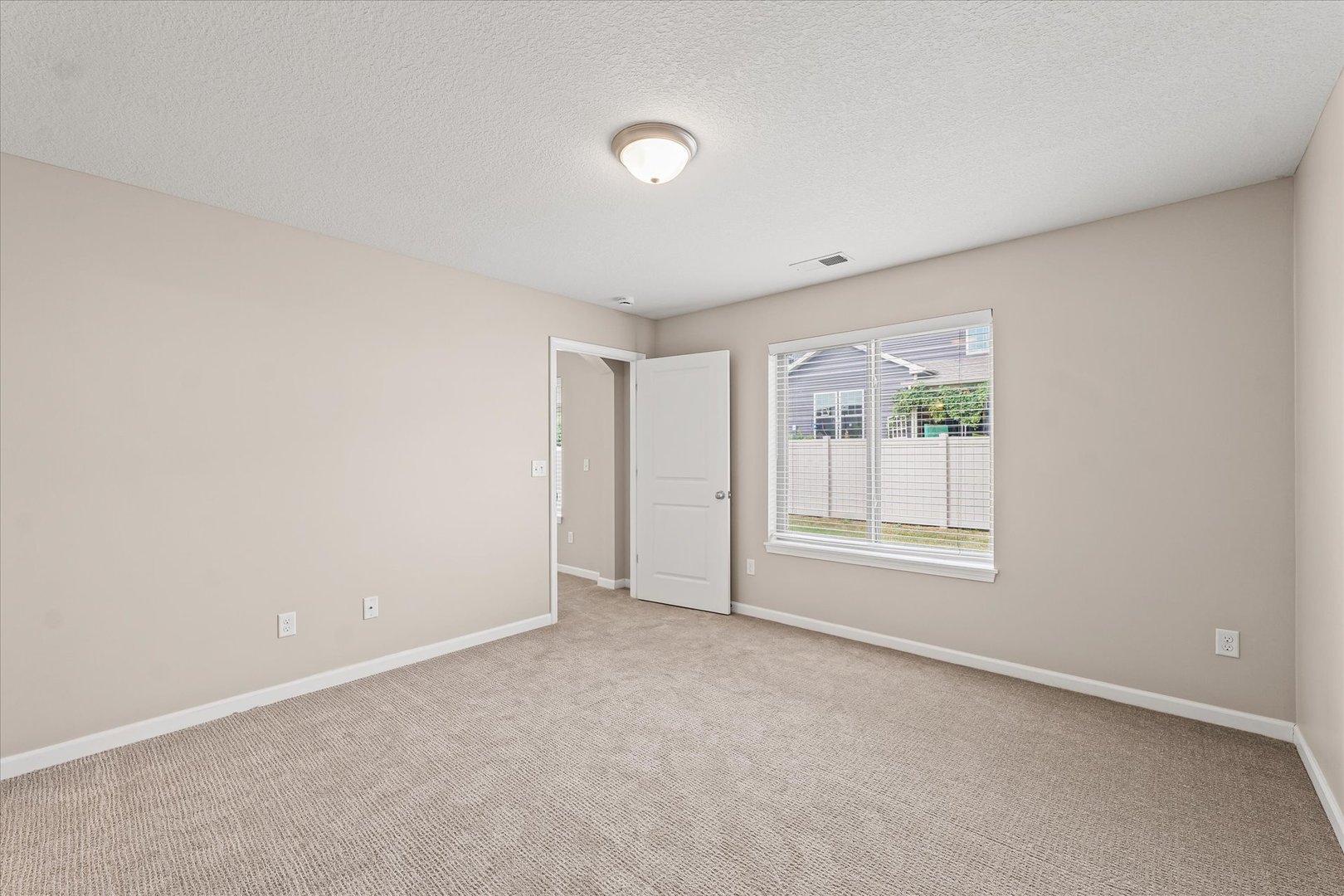 3109 Stanley Lane Champaign, IL 61822 - Photo 23 of 39 an empty room with a window
