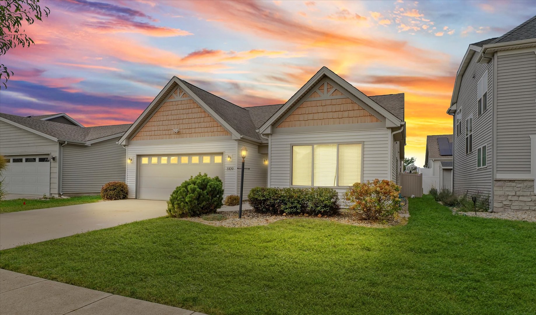3109 Stanley Lane Champaign, IL 61822 - Photo 3 of 39 a front view of a house with garden