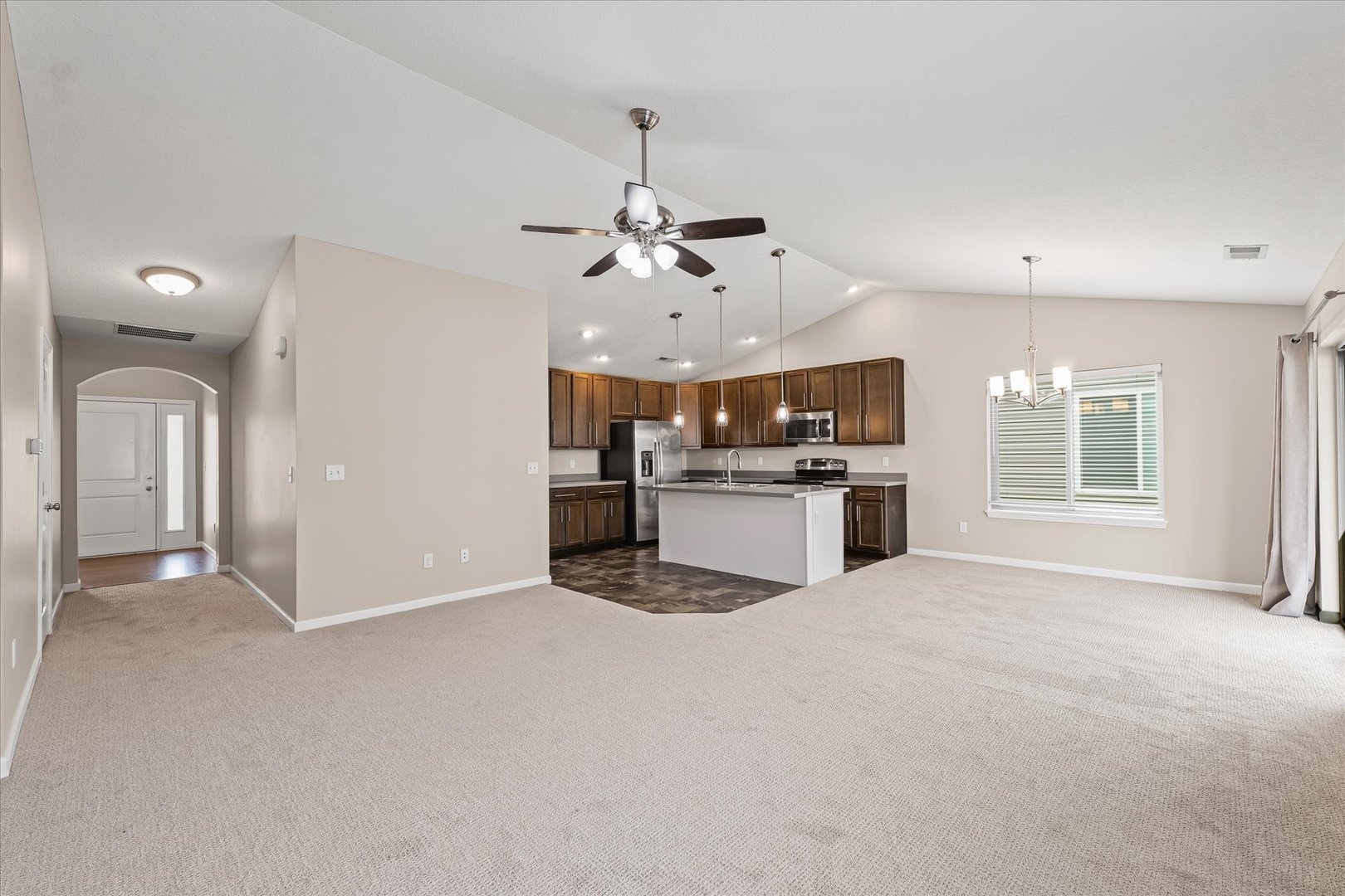 3109 Stanley Lane Champaign, IL 61822 - Photo 8 of 39 a view of a kitchen with a sink and a window