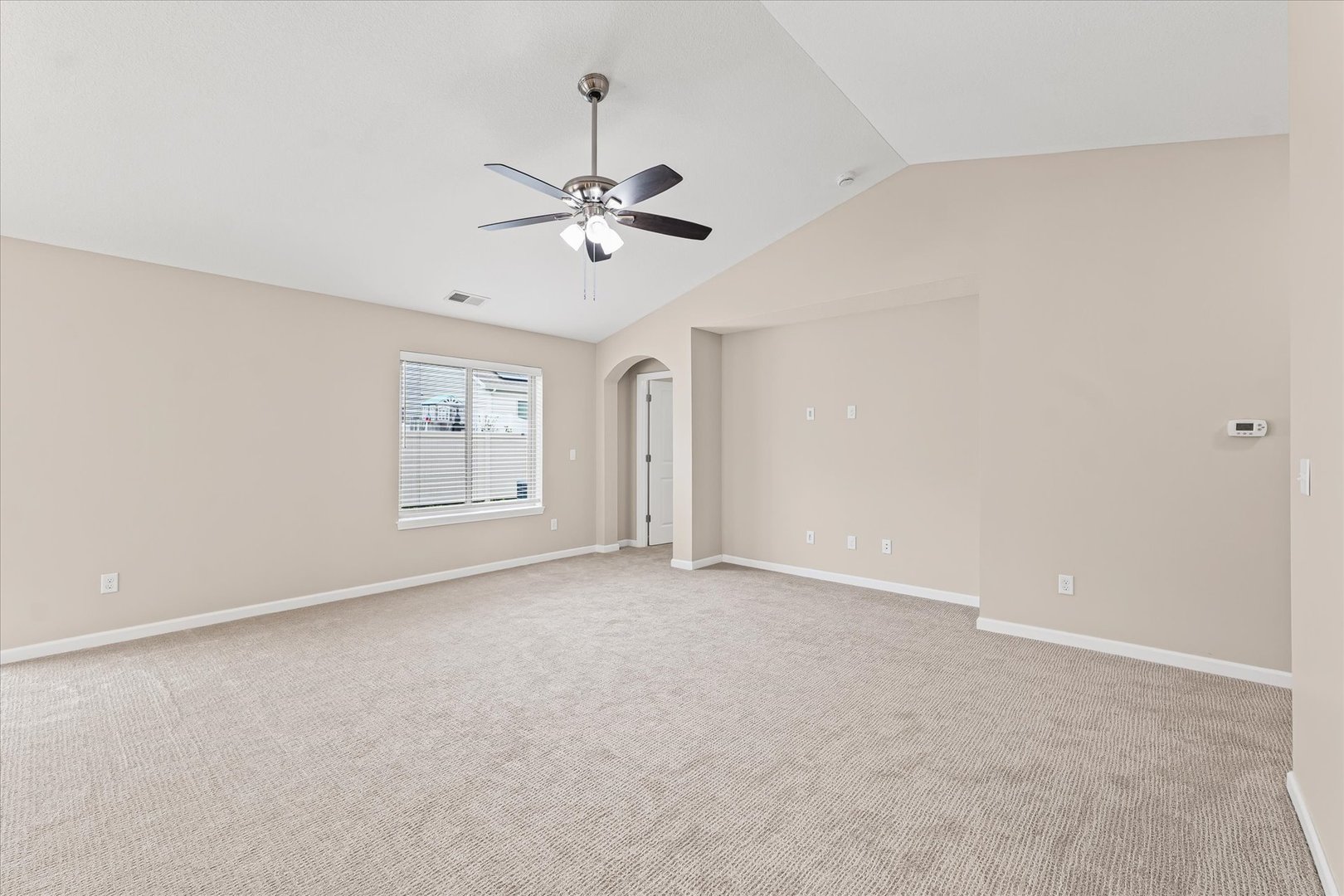 3109 Stanley Lane Champaign, IL 61822 - Photo 9 of 39 a view of an empty room with a window