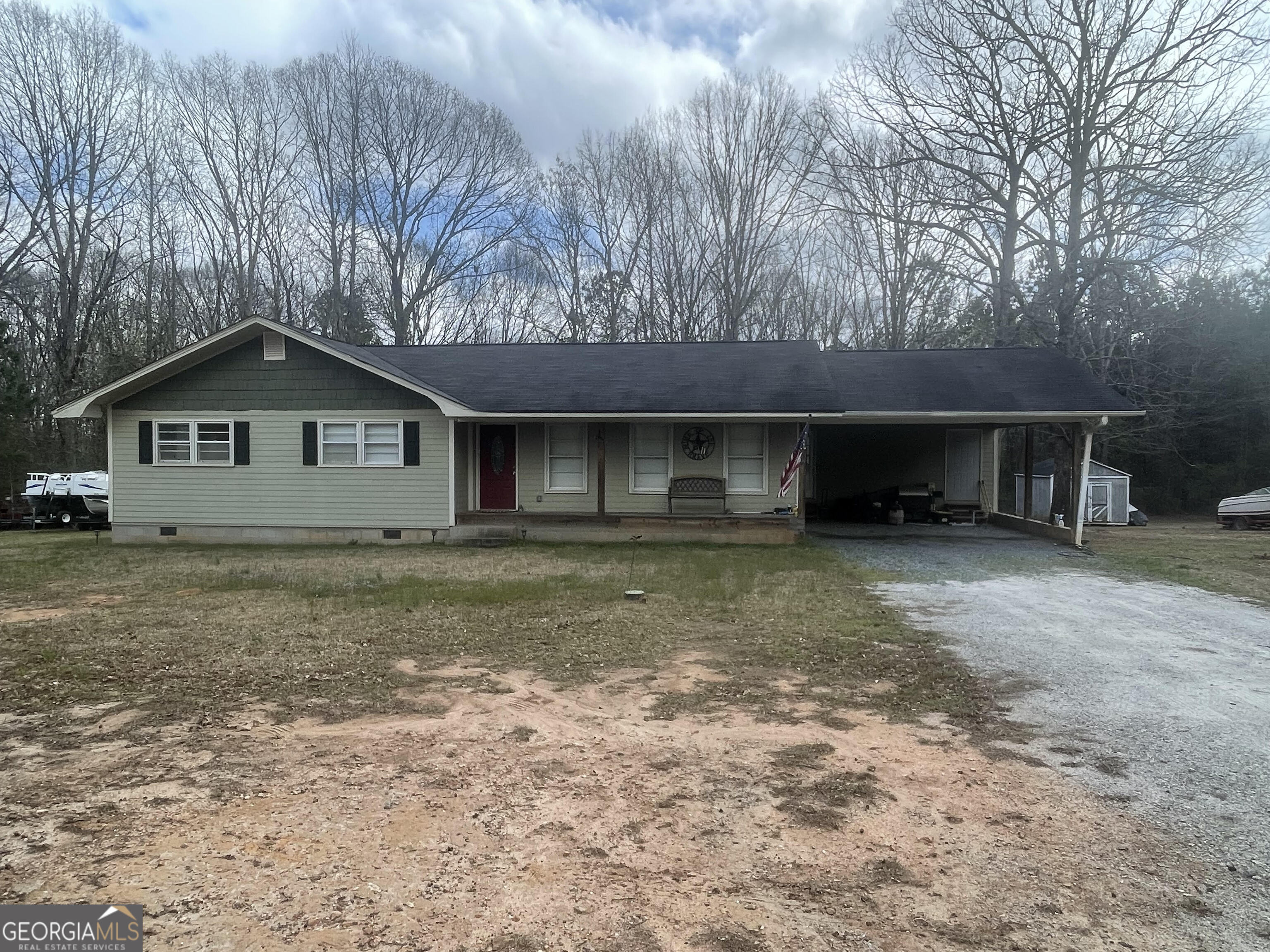 408 Piedmont Road Barnesville, GA 30204 - Photo 1 of 1 a view of a house with a yard and chairs