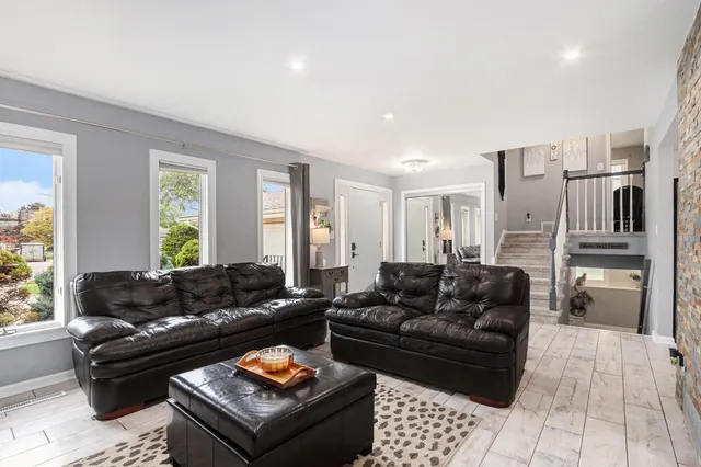 a living room with furniture and a couch