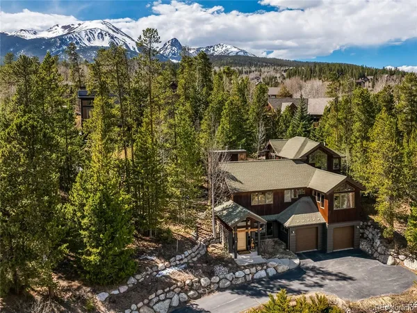 a view of a balcony with table and chairs
