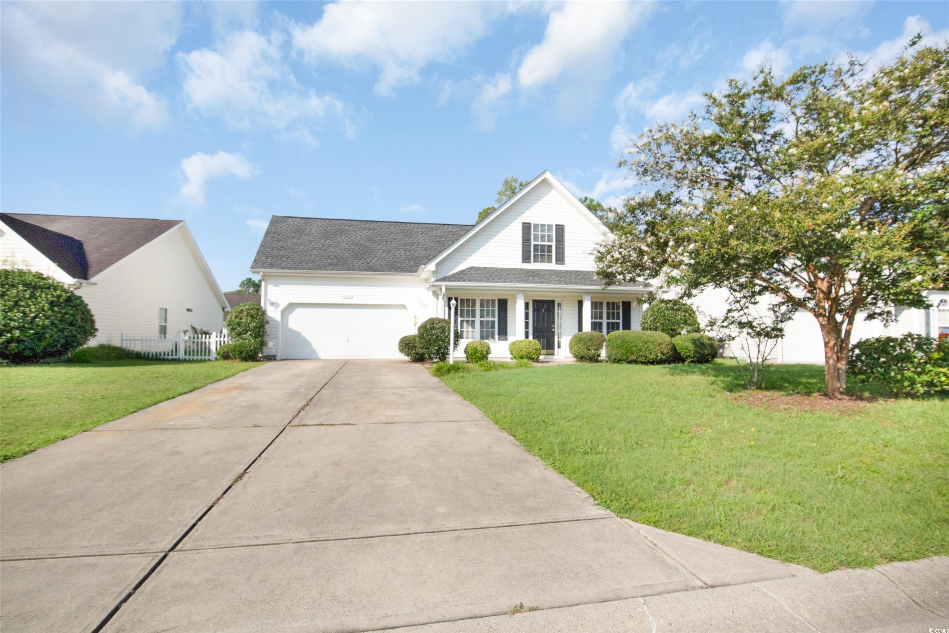 8005 Pleasant Point Lane Myrtle Beach, SC 29579 - Photo 3 of 27 View of front of house featuring a garage and a fr