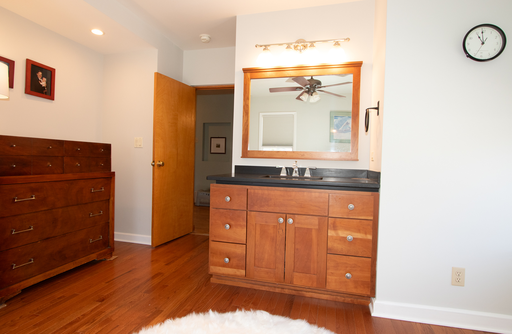 227 Thatcher Avenue River Forest, IL 60305 - Photo 25 of 42 a bathroom with a granite countertop sink and a mirror