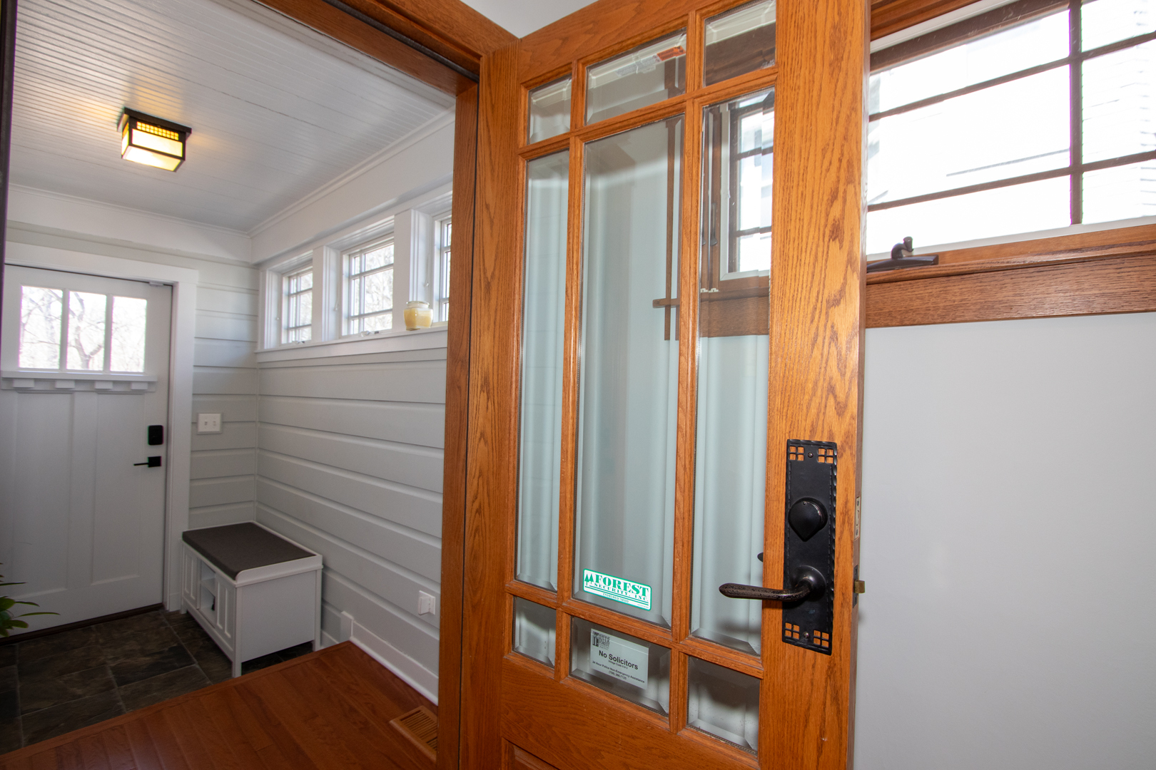 227 Thatcher Avenue River Forest, IL 60305 - Photo 4 of 42 a view of an entryway with wooden floor and windows