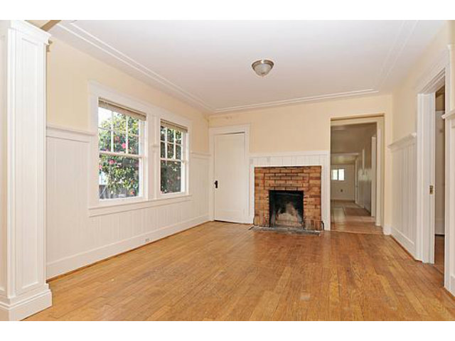 22 Bloomfield Road Burlingame, CA 94010 - Photo 6 of 8 a view of an empty room with a window and fireplace