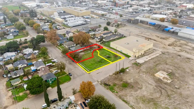 a view of a yard with an outdoor space