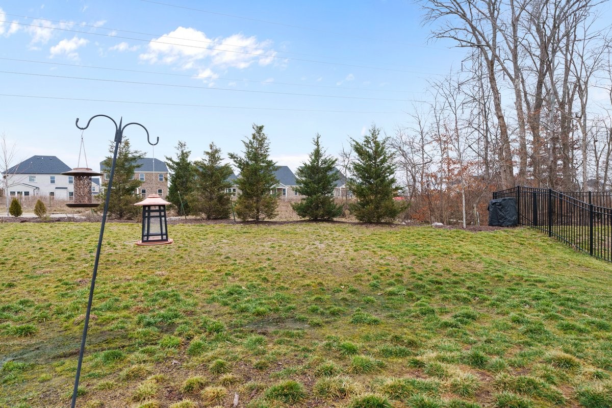 1049 Fallow Road Mount Juliet, TN 37122 - Photo 40 of 55 a backyard of a house with table and chairs