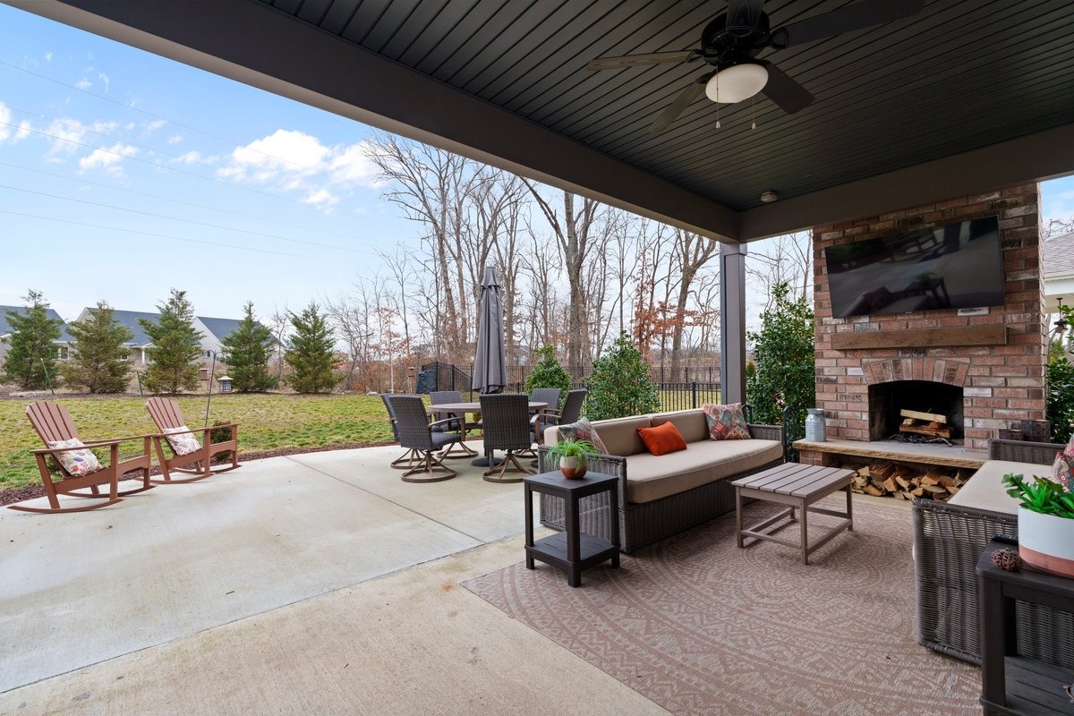 1049 Fallow Road Mount Juliet, TN 37122 - Photo 41 of 55 a outdoor space with patio fireplace and couches