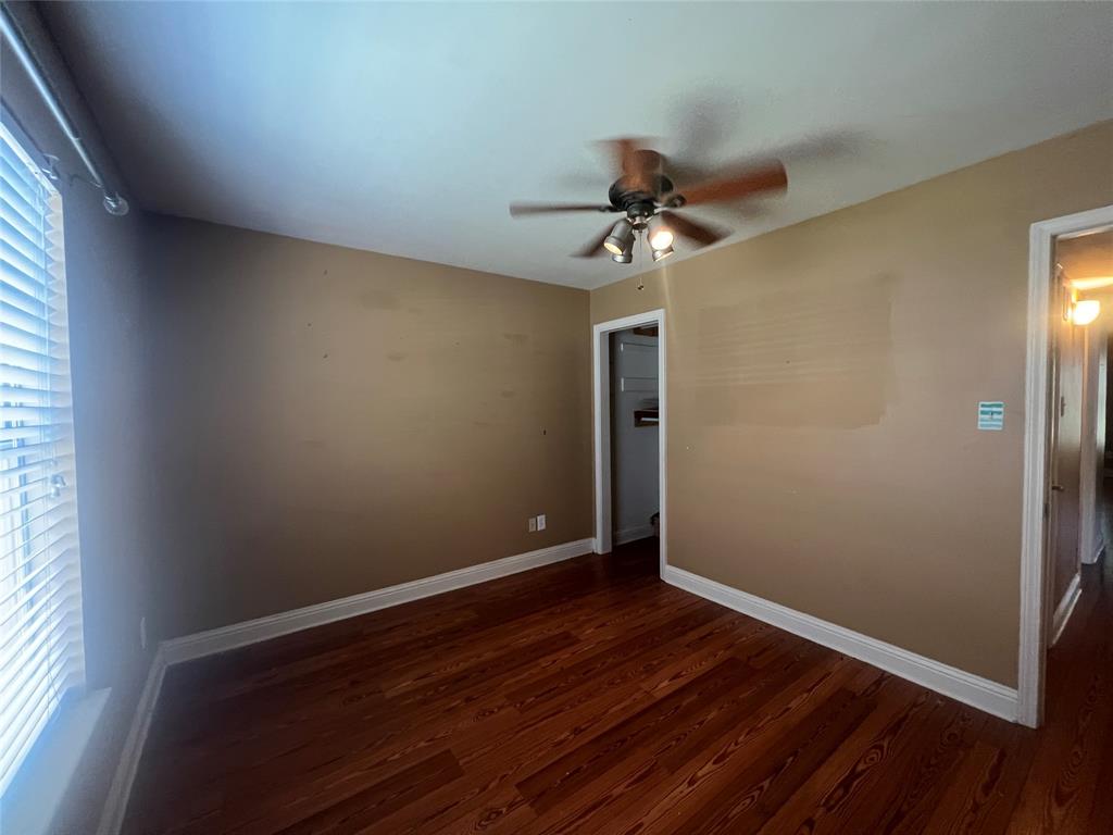 3730 Fairfield Avenue, Unit 129 Shreveport, LA 71104 - Photo 12 of 15 a view of room with hardwood floor and fan