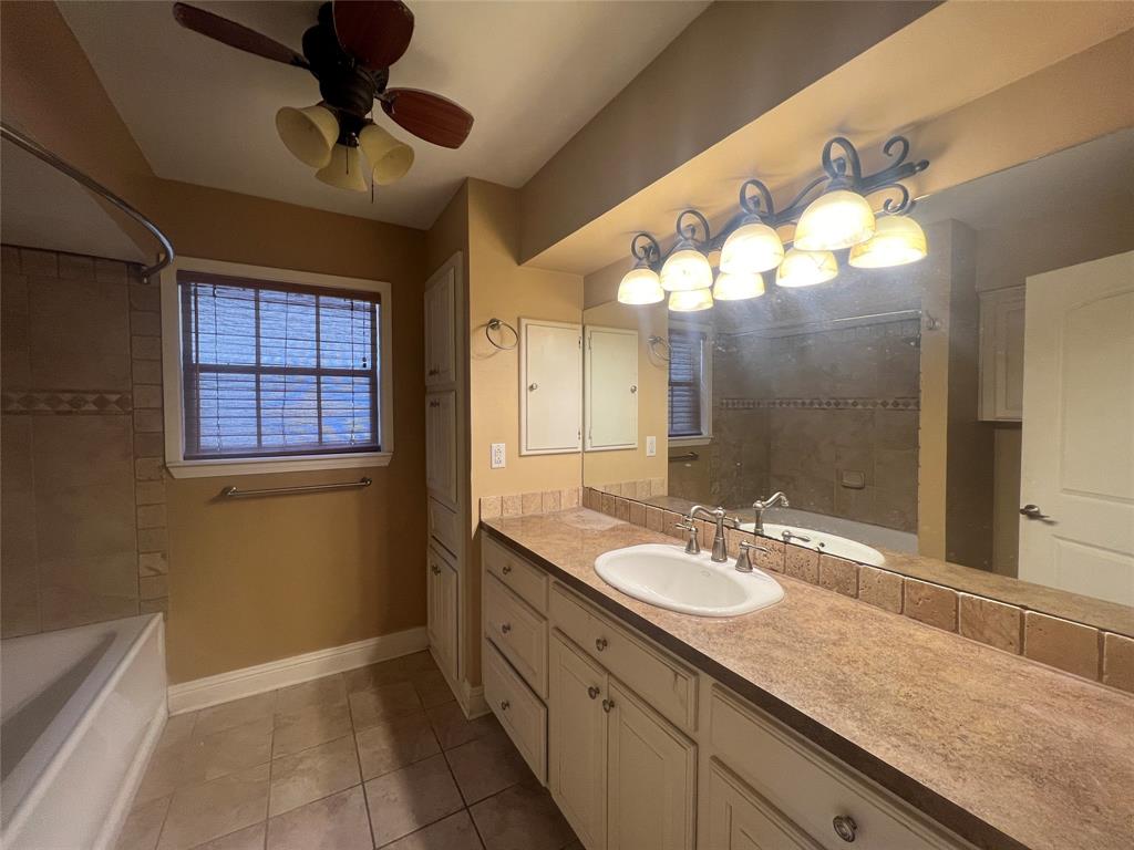 3730 Fairfield Avenue, Unit 129 Shreveport, LA 71104 - Photo 13 of 15 a bathroom with a sink and a mirror
