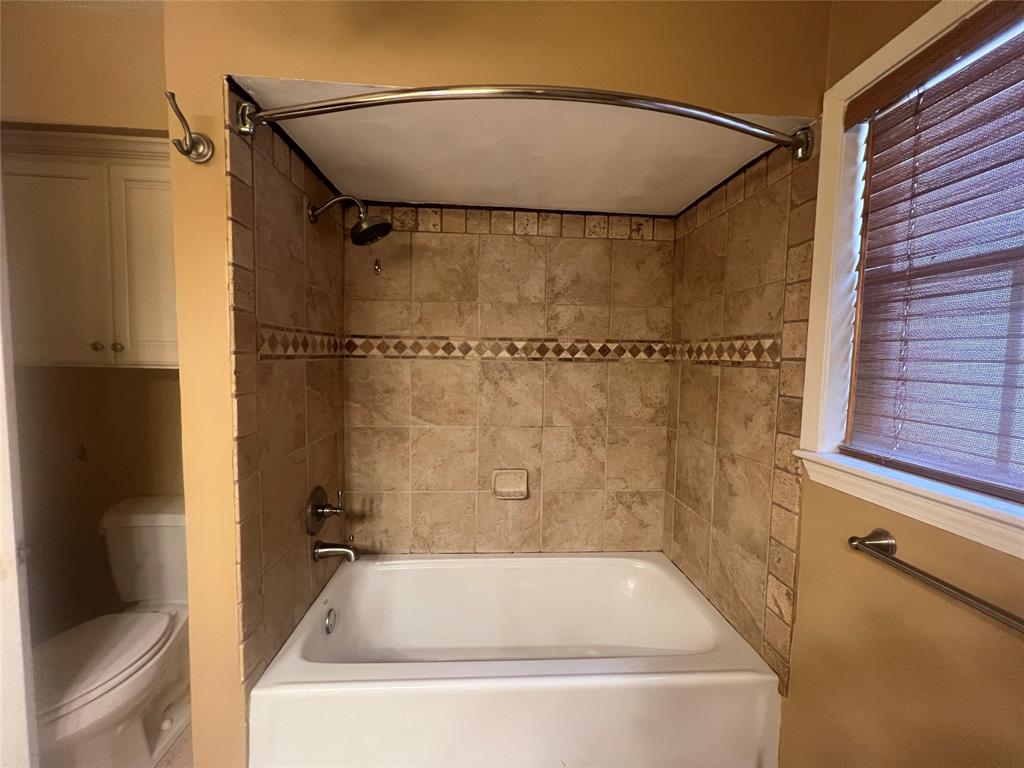 3730 Fairfield Avenue, Unit 129 Shreveport, LA 71104 - Photo 14 of 15 a bathroom with a bathtub and a shower