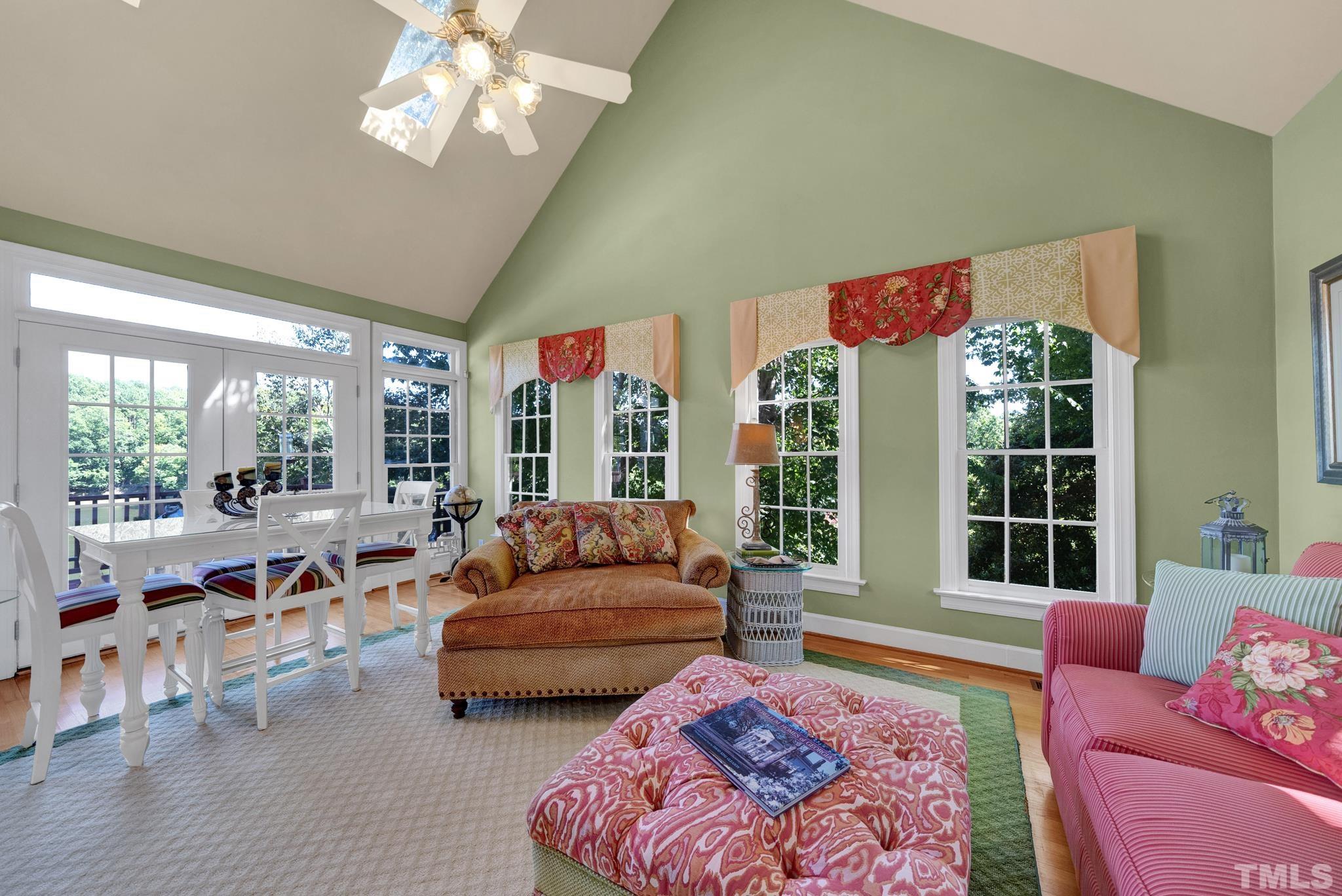 207 Holly Circle Clayton, NC 27527 - Photo 12 of 30 a living room with furniture and a large window