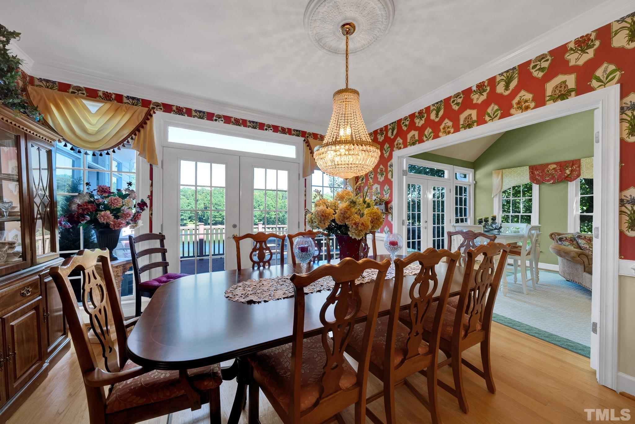 207 Holly Circle Clayton, NC 27527 - Photo 14 of 30 a view of a dining room with furniture window and outside view