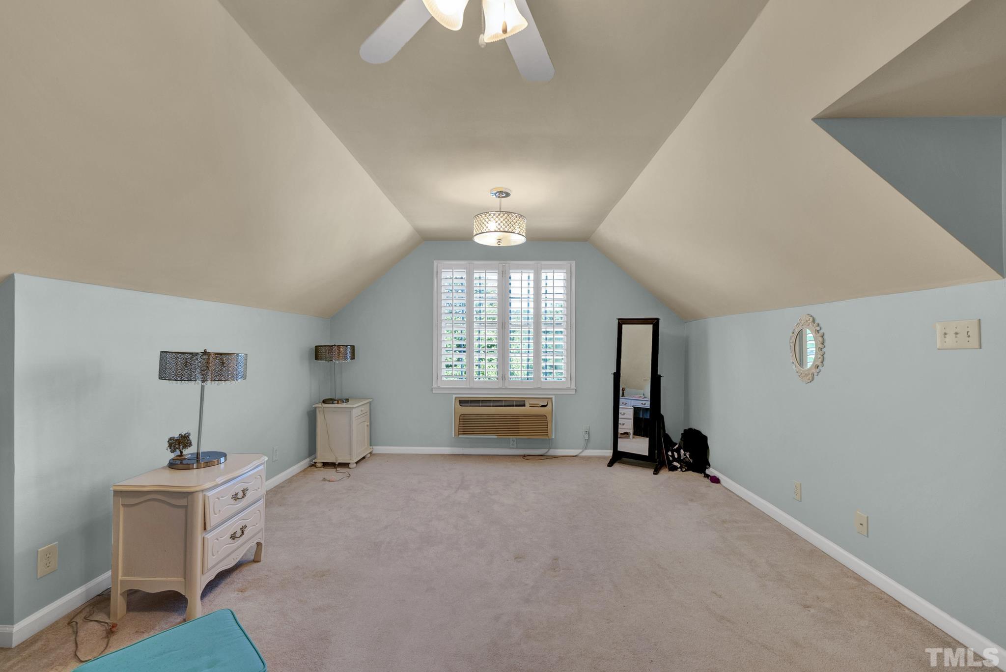 207 Holly Circle Clayton, NC 27527 - Photo 17 of 30 a living room with furniture and a window