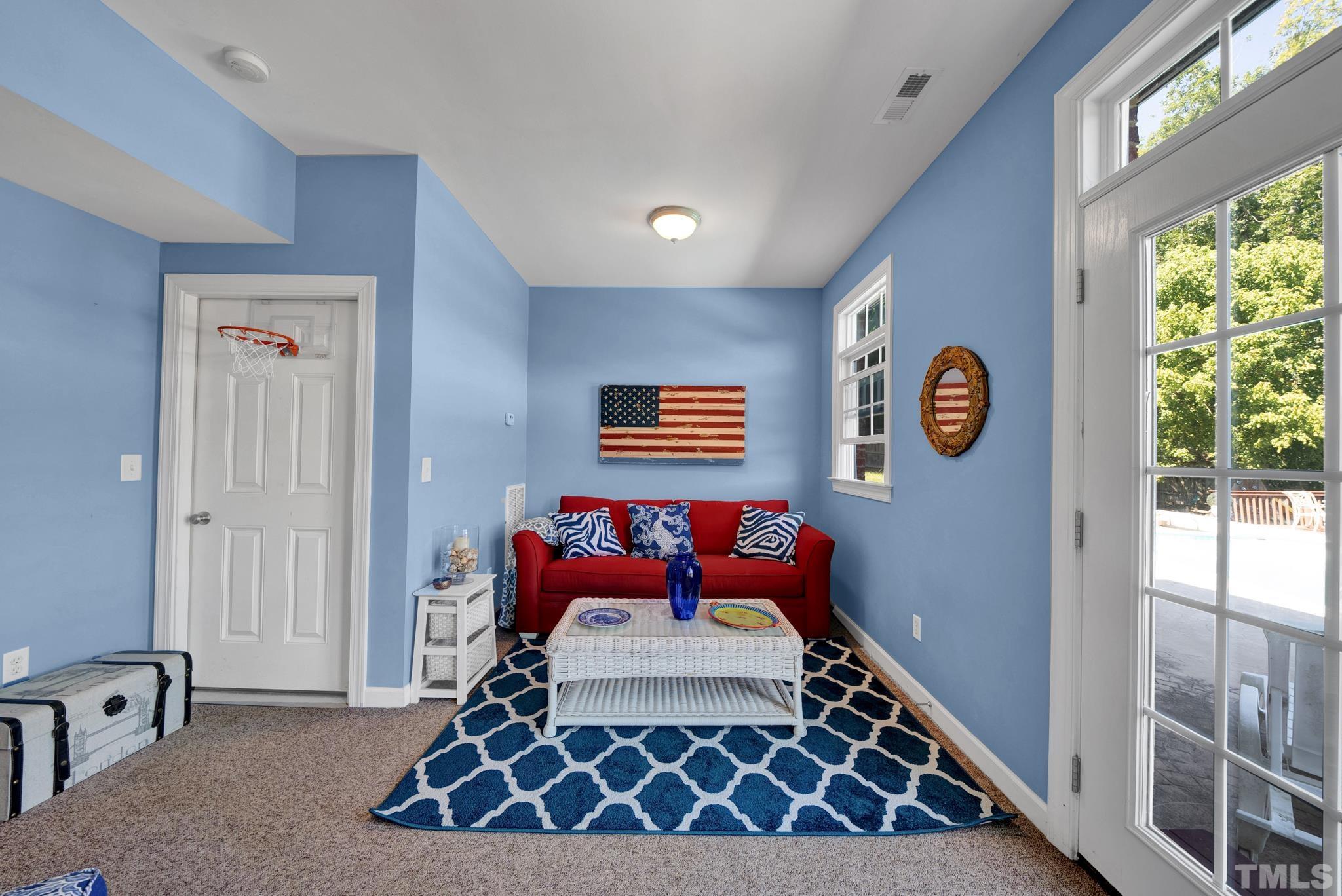 207 Holly Circle Clayton, NC 27527 - Photo 26 of 30 a bedroom with a bed and a window