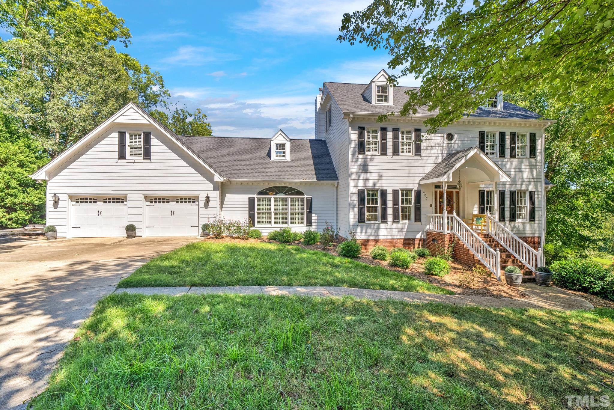207 Holly Circle Clayton, NC 27527 - Photo 4 of 30 front view of a house with a yard