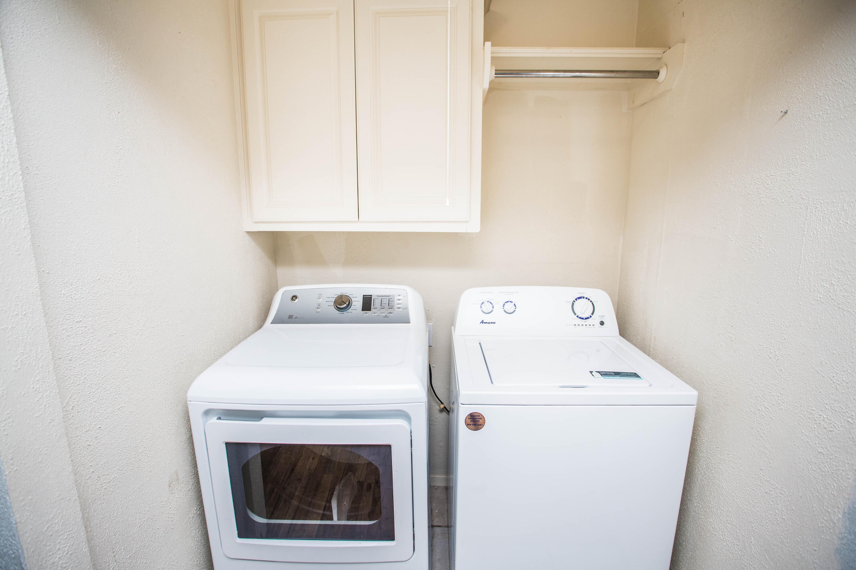4213 40th Street Lubbock, TX 79413 - Photo 23 of 30 a utility room with dryer and washer
