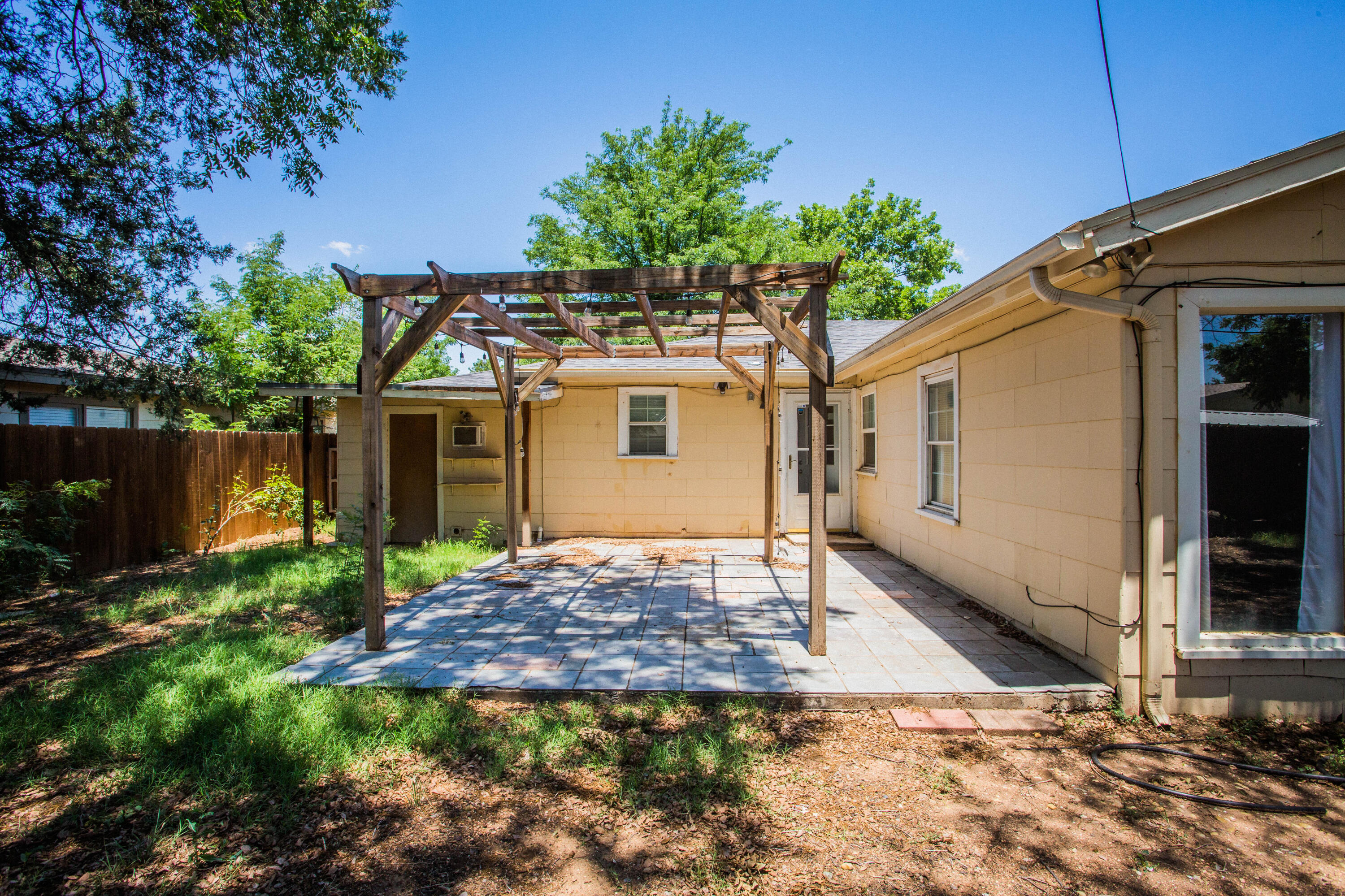 4213 40th Street Lubbock, TX 79413 - Photo 28 of 30 a view of a house with a yard
