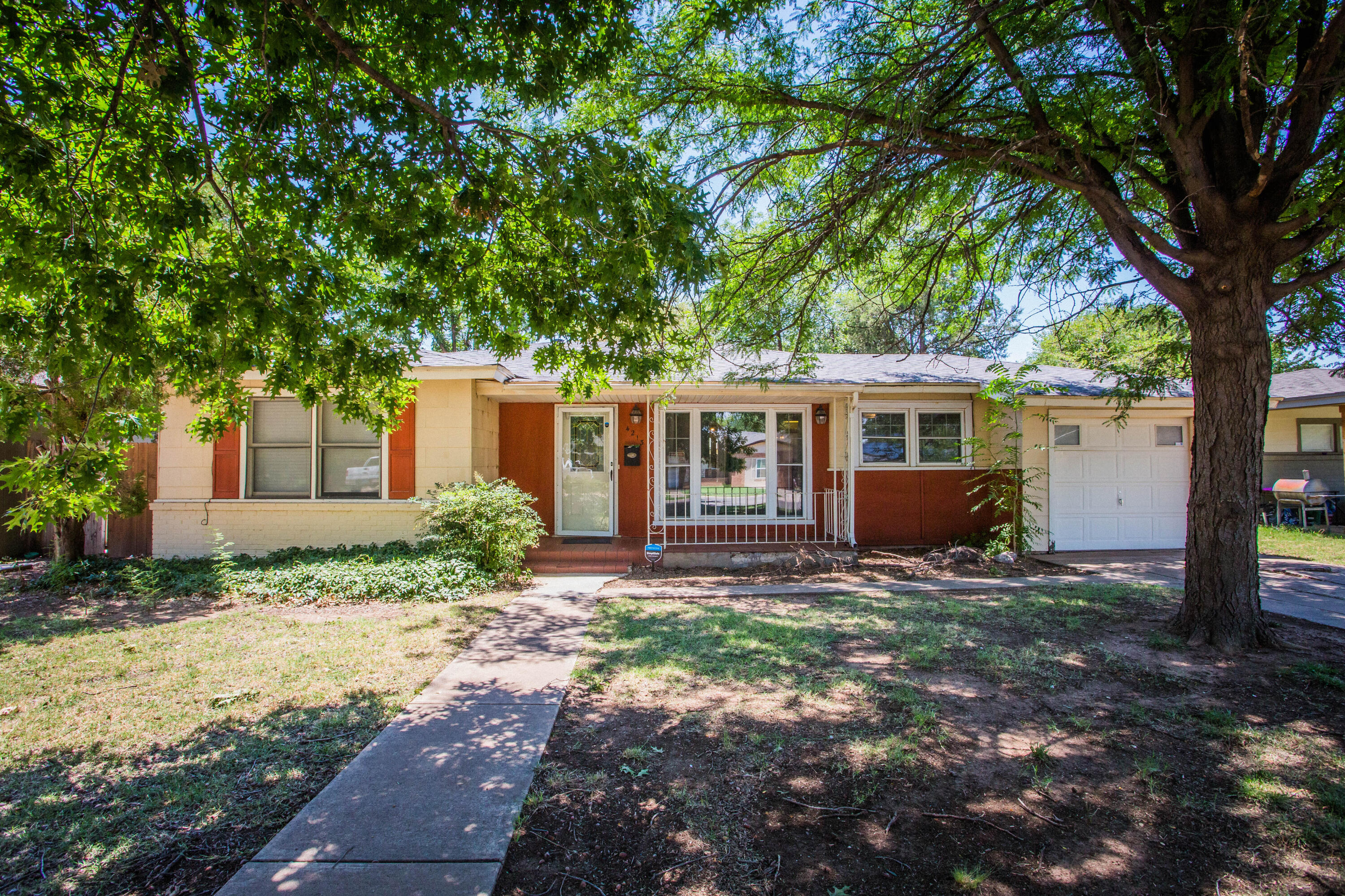 4213 40th Street Lubbock, TX 79413 - Photo 30 of 30 a view of a house with a yard