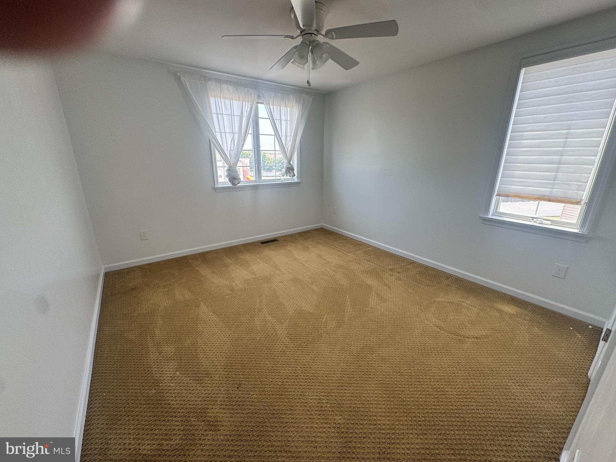 3313 Pietro Way Philadelphia, PA 19145 - Photo 8 of 16 a view of an empty room with a window