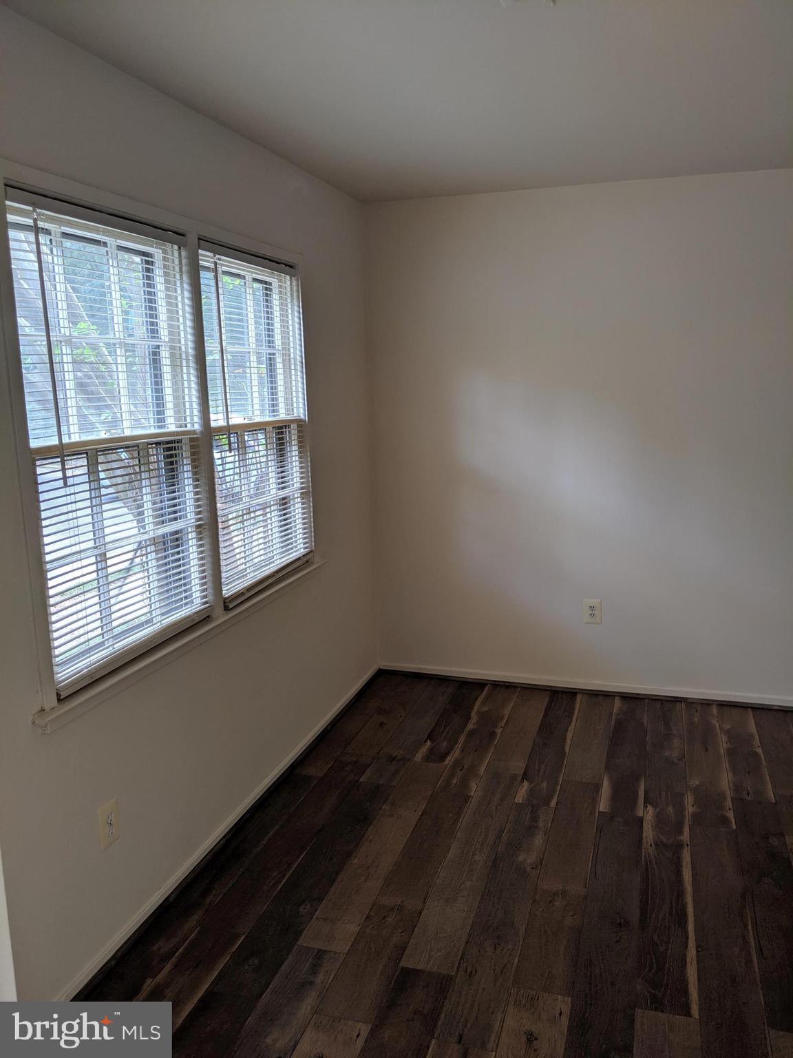 7760 Matisse Way Springfield, VA 22153 - Photo 3 of 21 a view of an empty room and window