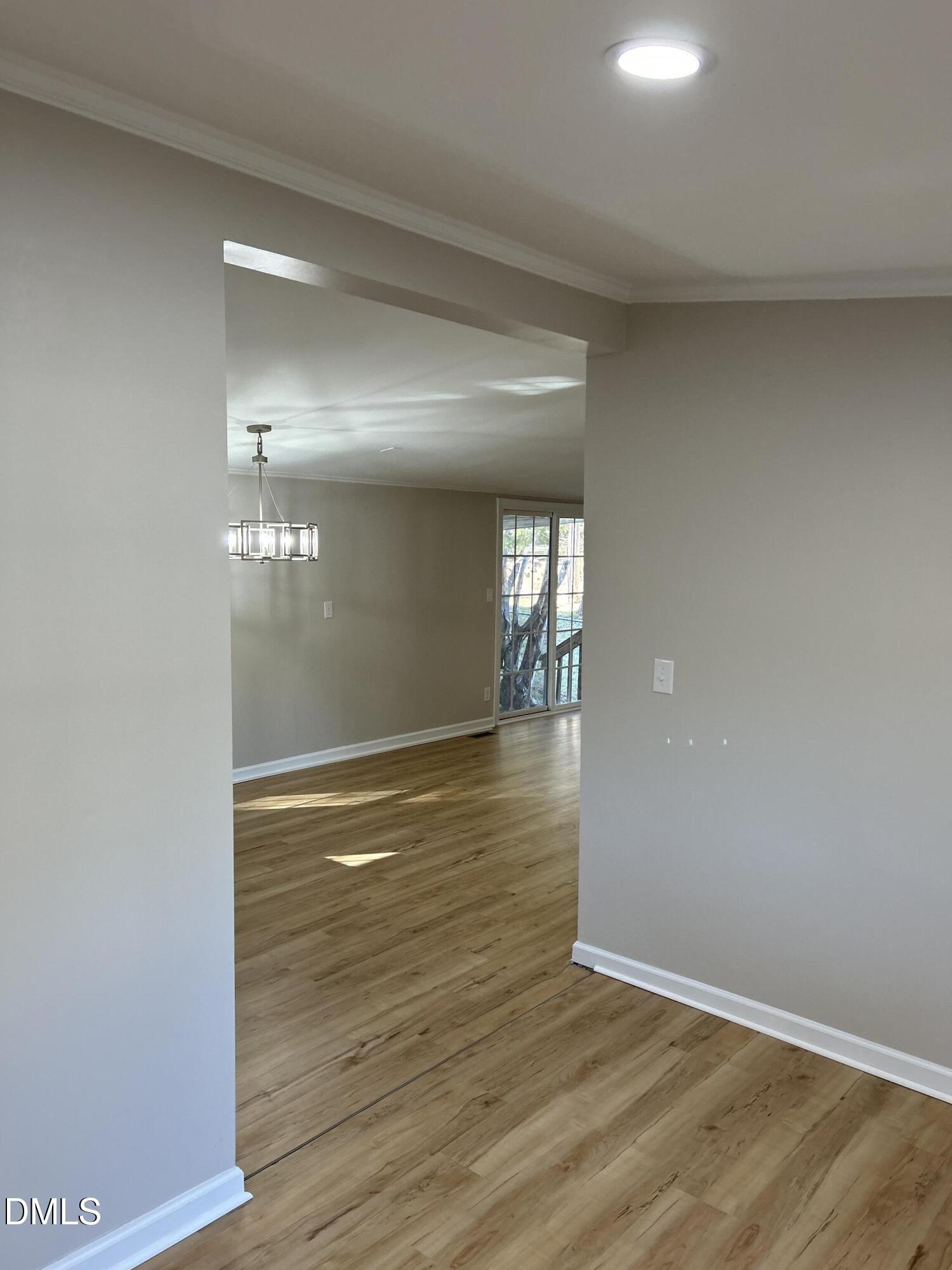 223 7th Street Wake Forest, NC 27587 - Photo 7 of 9 a view of empty room with wooden floor