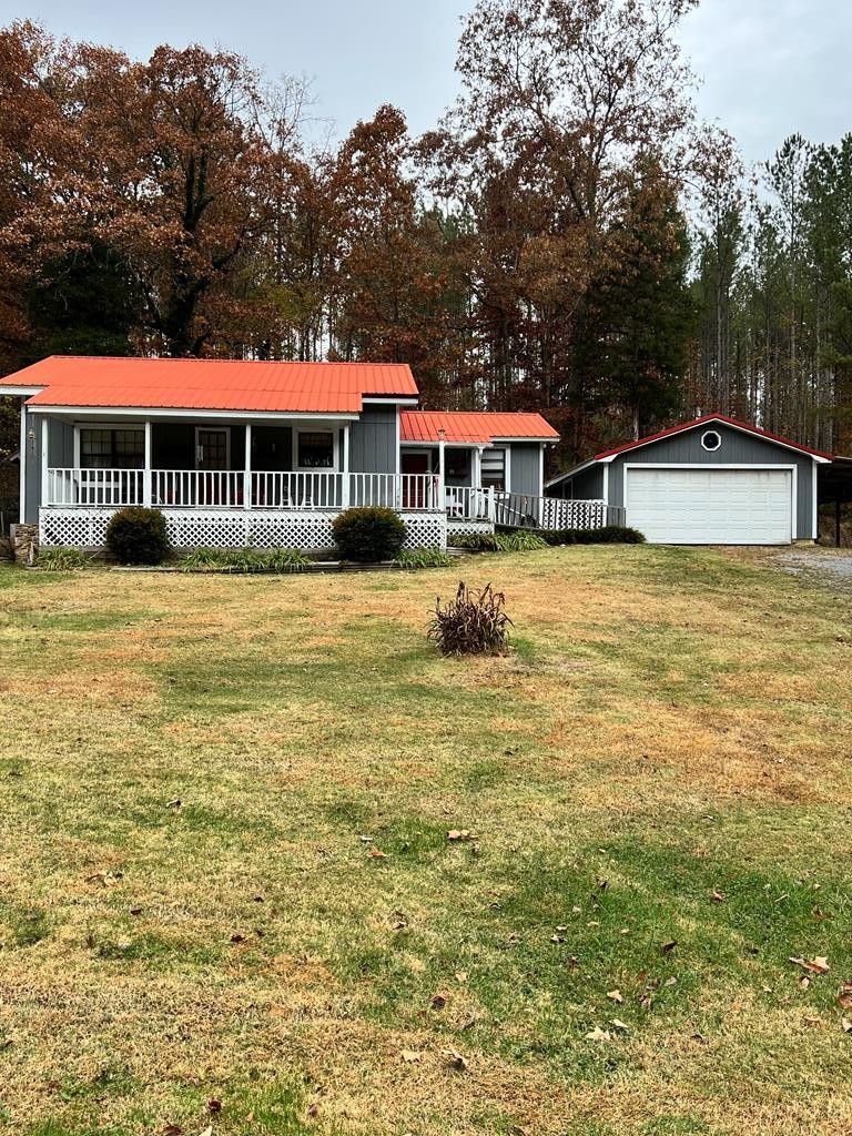 2034 Old River Road Charleston, TN 37310 - Photo 23 of 29 a front view of a house with a yard
